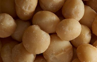 Close up of macadamia nuts, one of the hero ingredients in weDo's products