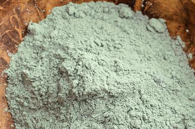 Close up of Green Clay, one of the hero ingredients in weDo/ Professional’s No Light & Soft Shampoo bar for fine hair.