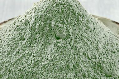 Close up of Green Clay, one of the hero ingredients in weDo/ Professional’s No Light & Soft Shampoo bar for fine hair.